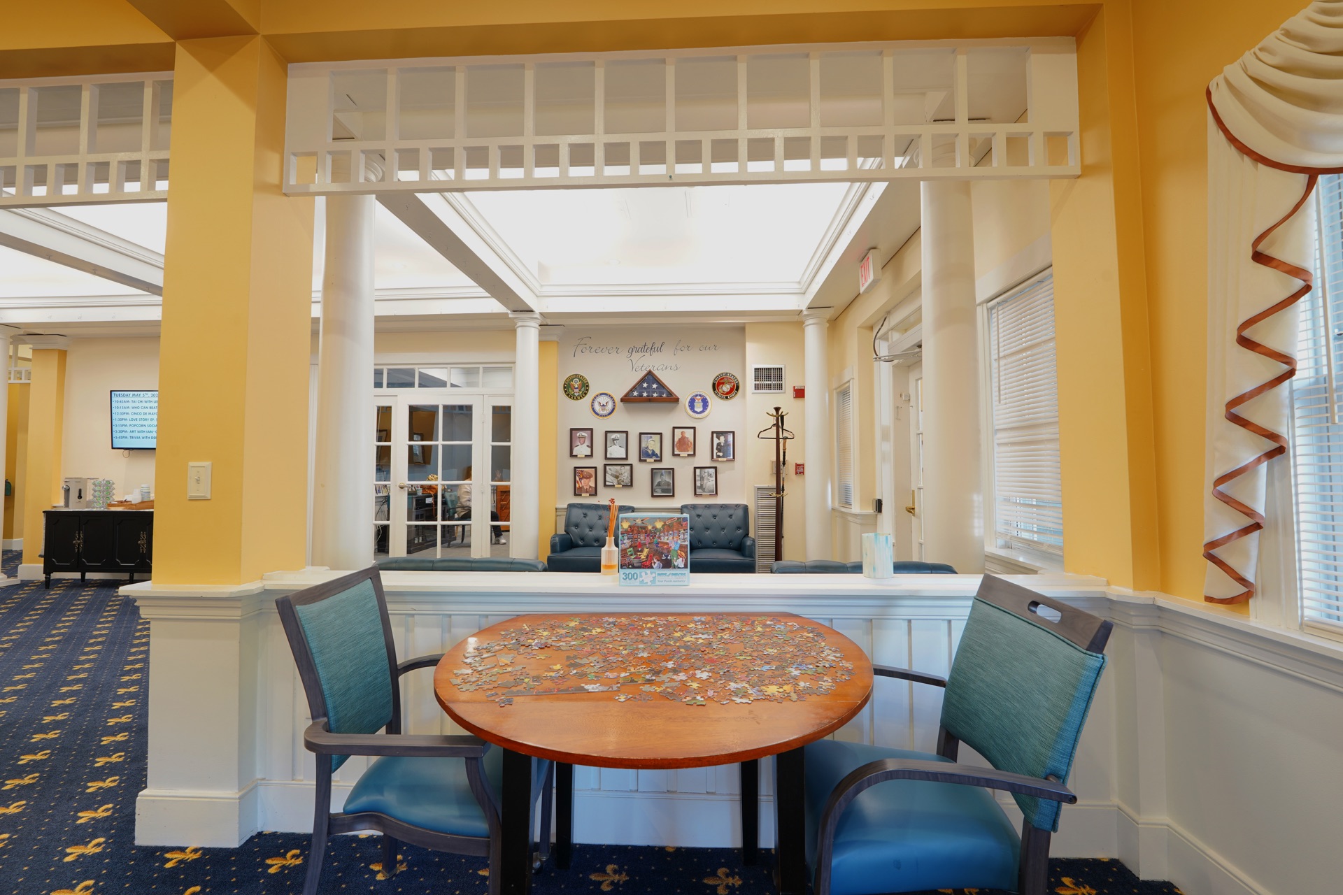 Welcoming foyer and living room at John Bertram House of Swampscott